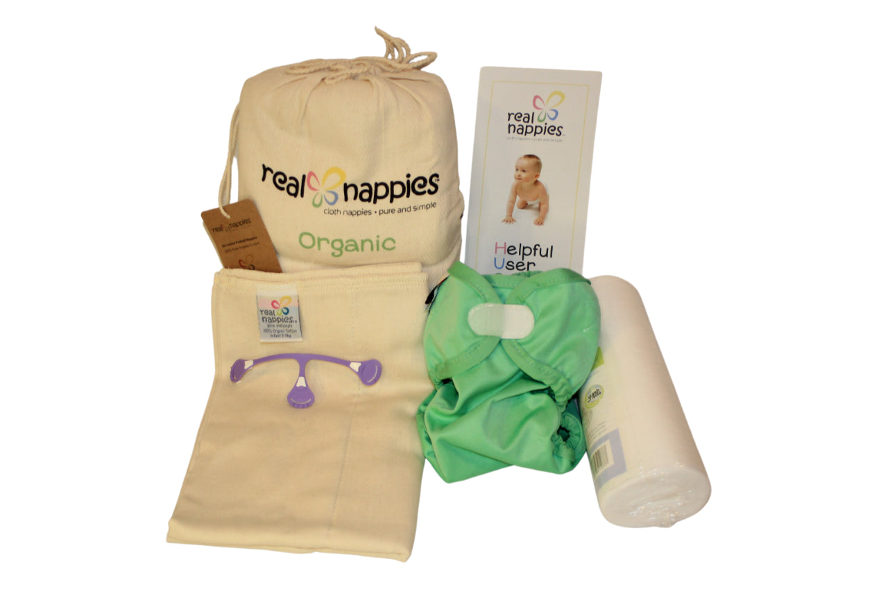 Trial Pack of Organic Cotton Cloth Nappy showing a pale green nappy cover and purple Snappi